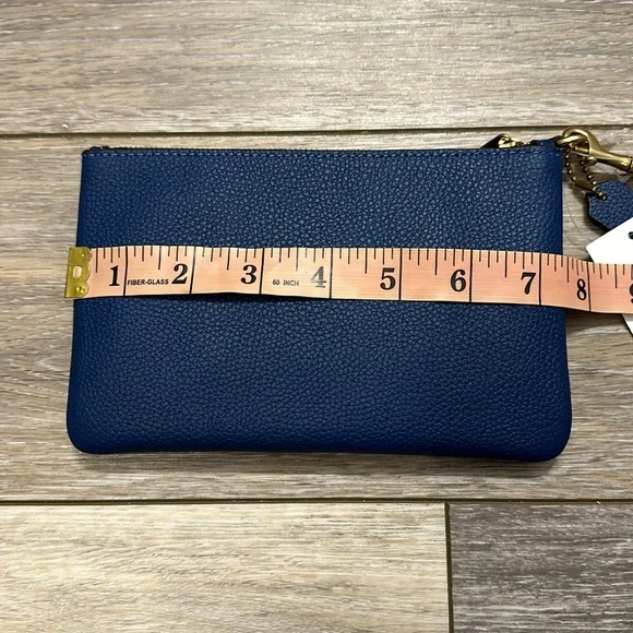 COACH WRISTLET PEBBLE LEATHER TRUE BLUE SMALL NWT - Picture 6 of 7
